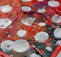 Wrapping paper from newspapers, a process photo, adding gesso
