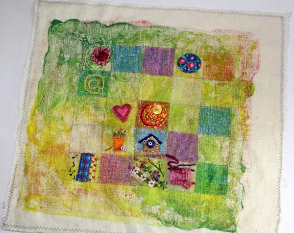 An embroidered sampler by Peony and Parakeet, a phase photo