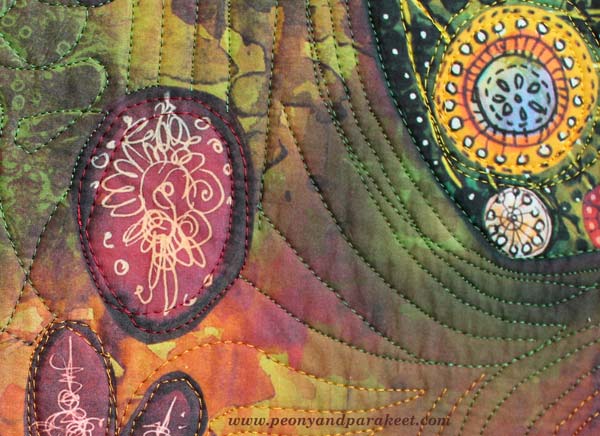 A detail of an art quilt using digitally printed design, by Peony and Parakeet