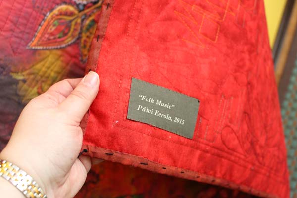 A detail of an art quilt using digitally printed design, by Peony and Parakeet