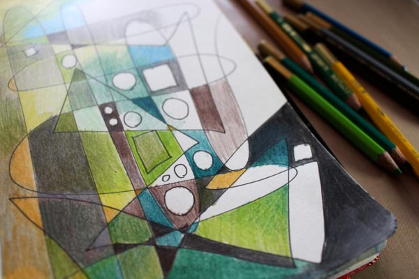 Coloring an art journal page with colored pencils, by Peony and Parakeet