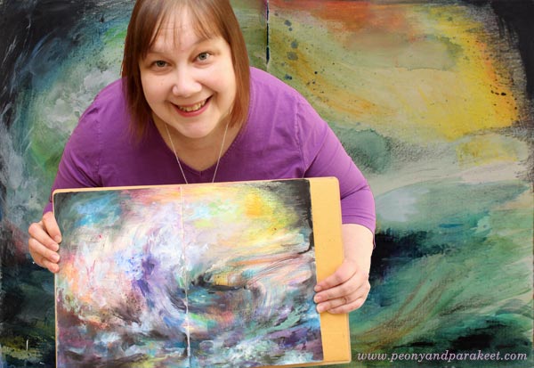 Paivi from Peony and Parakeet with her seascape paintings