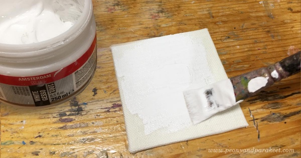 Preparing a small canvas painting by Paivi Eerola from Peony and Parakeet