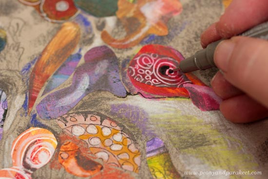 Finishing a paper collage by Peony and Parakeet. See the step-by-step instructions for using colored pencils and paper scraps!