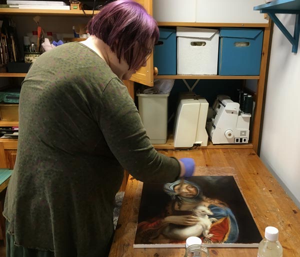 Varnishing an oil painting with Rublev Dammar Finishing Varnish. By Paivi Eerola from Peony and Parakeet, Finland.