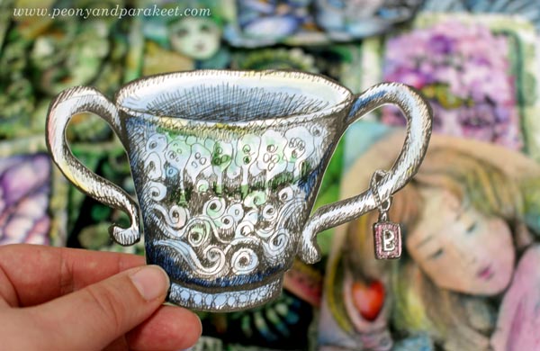 Drawing collage pieces. A hand-drawn teacup by Paivi Eerola of Peony and Parakeet.