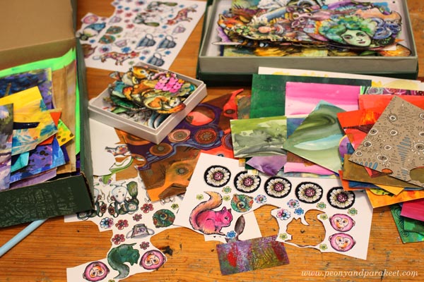 Boxes of hand-decorated papers by Paivi Eerola of Peony and Parakeet.