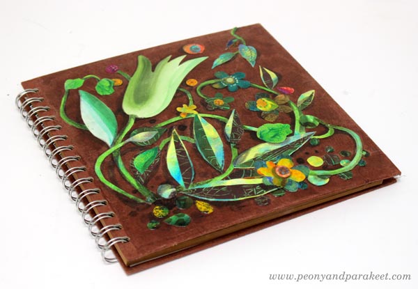 A painted paper collage. A sketchbook cover by Paivi Eerola of Peony and Parakeet.