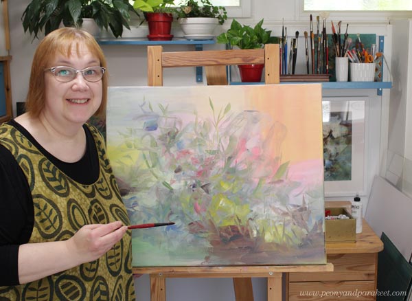 Paivi Eerola and her painting in progress.