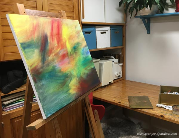 Starting an abstract landscape painting by Paivi Eerola of Peony and Parakeet