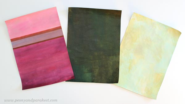 Three painted backgrounds. The backgrounds set a color palette for the papers.