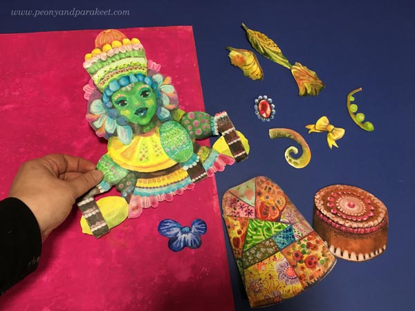 Arranging handpainted collage pieces