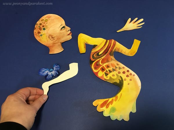 Arranging handpainted collage pieces