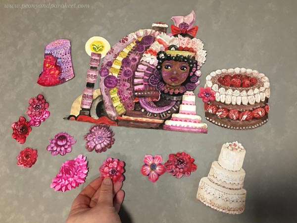Arranging handpainted collage pieces