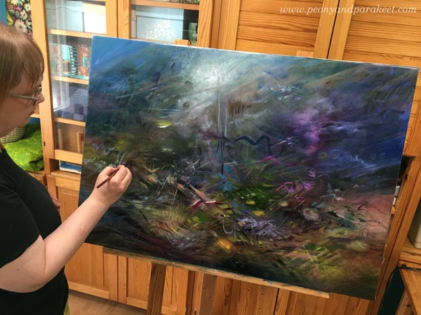 An oil painting in progress. By Paivi Eerola of Peony and Parakeet.