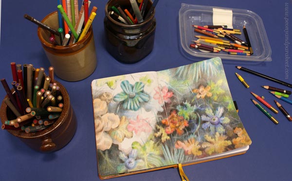 Joyful flowers in an Archer and olive blank notebook. Drawn with colored pencils. By Paivi Eerola of Peony and Parakeet.