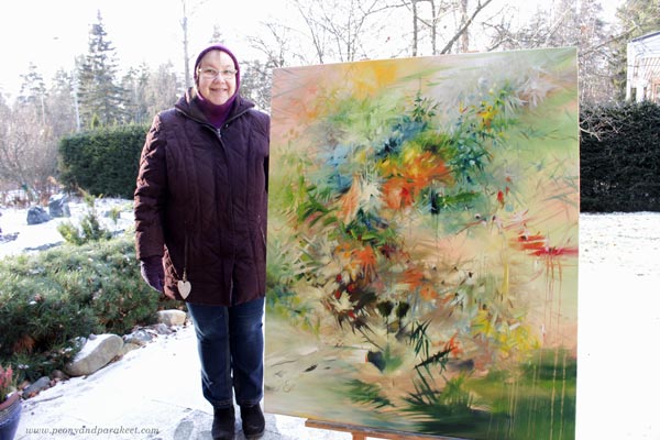 Paivi Eerola and one of her oil paintings. Read more about her thoughts on artistic inspiration!