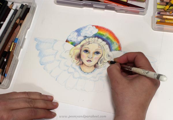 Creating colored pencil art by using imagination.