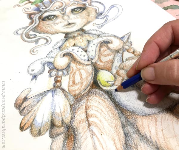 Coloring details with crayons.