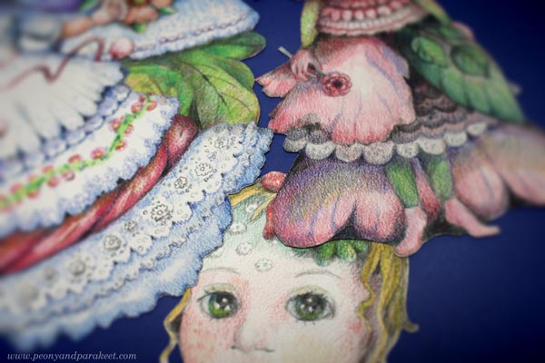 Doll illustrations by Paivi Eerola.