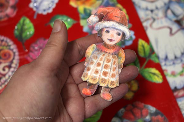A small Christmas girl in colored pencils. By Päivi Eerola, Finland.