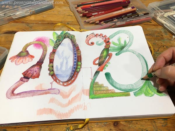 Decorating numbers with colored pencils. Creating a spread for an art journal.