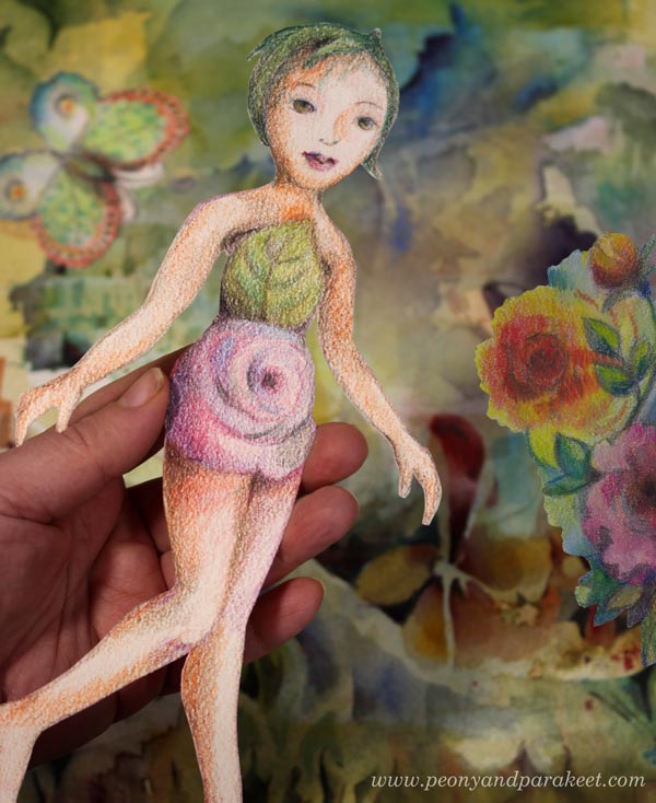A hand-drawn paper doll.