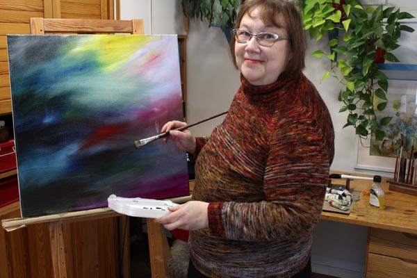 Starting a new painting. Creating wonderland art. Paivi Eerola in her studio.