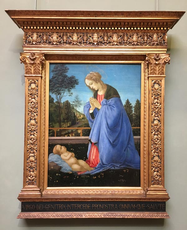 Pietro Perugino's painting and the beautiful frame. Uffizi gallery, Florence, Italy.