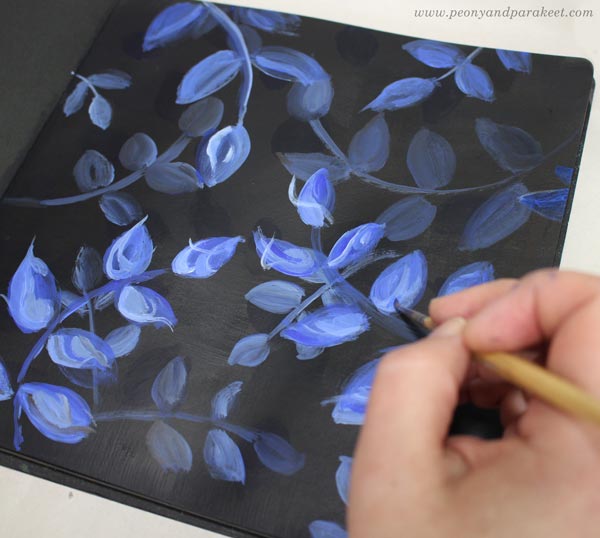 Painting leaves in decorative style.