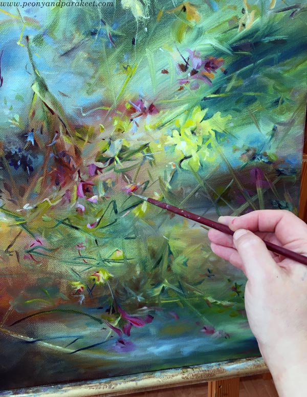 Painting a floral abstract painting. Embracing nature's richness in art.