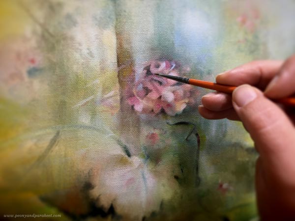 Adjusting a flower painting with a small brush. Finiding emotional connection when painting abstract florals.