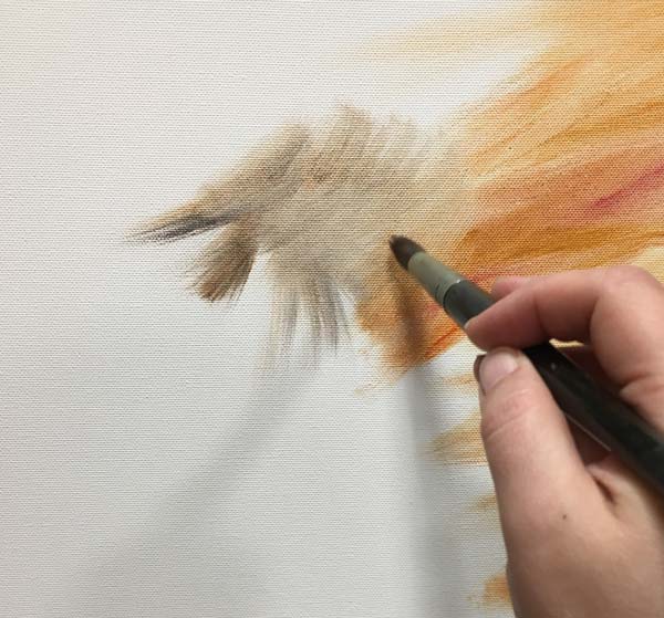 Painting the first strokes. Artist's focus comes to mind when starting a new painting.