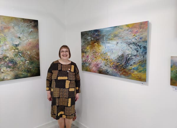 Paivi Eerola and her oil paintings. Art exhibition.