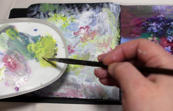 Using a palette for painting quick abstract flowers.