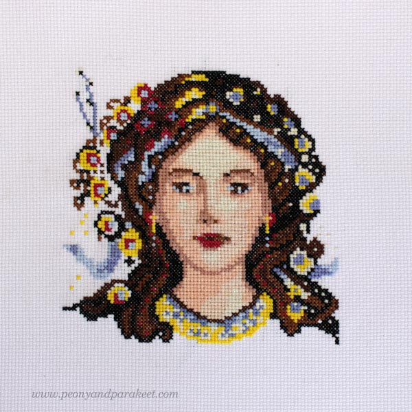 Primavera fancy lady portrait cross stitch pattern by Paivi Eerola.