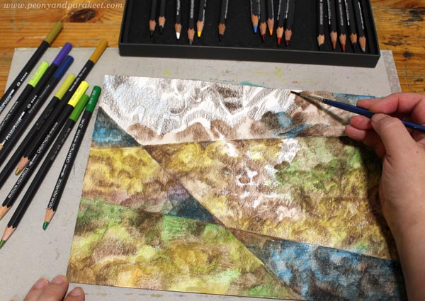 Adding water to a watercolor pencil drawing. Doodling with a brush.