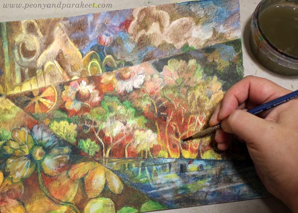 Using a brush to spread the color in the details.