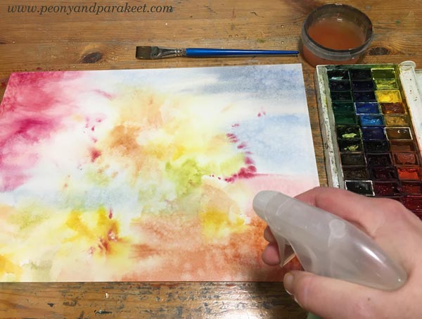 Starting an intuitive floral watercolor painting.