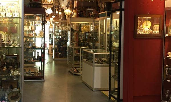 Antiekcentrum, the Netherlands. Narrow corridors one after another, full of antique mini-shops.