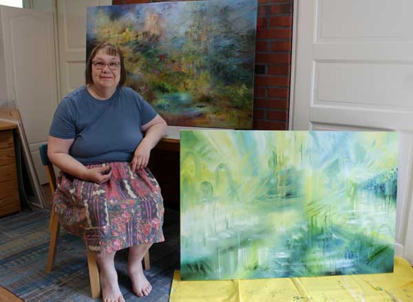 Artist in a studio on a hot summer.