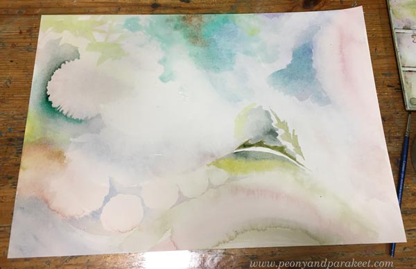 Starting an intuitive floral watercolor painting.