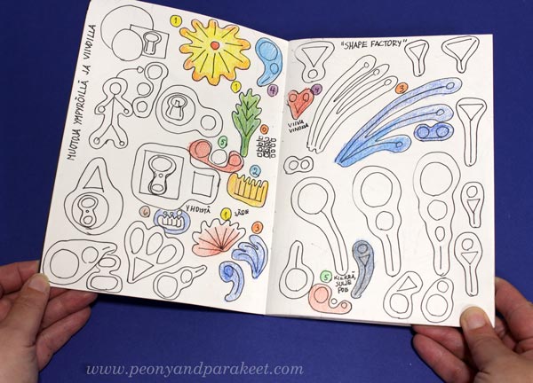 Drawing ideas on a small sketchbook.
