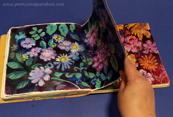Dylusions Creative Journal Square filled with flower paintings