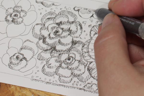 Drawing flowers with black ink. Illustrating flowers.