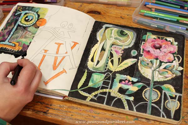 Creative lettering on art journal pages.