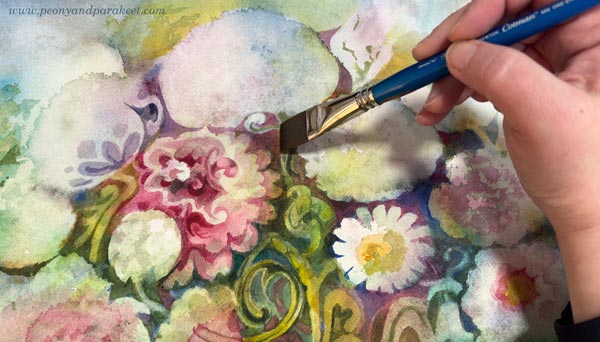 Painting ornamental layers in watercolor.