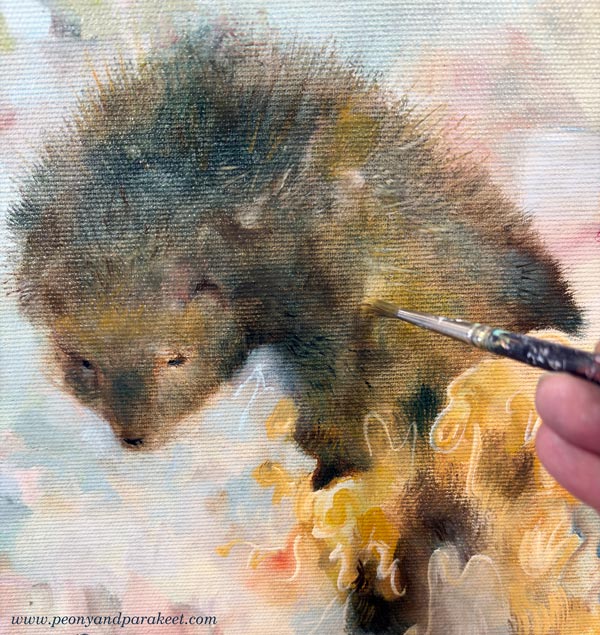Painting fur by layering colors and strokes.