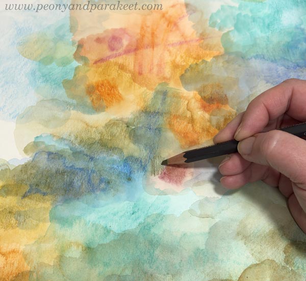 Adding layers with watercolor pencils.