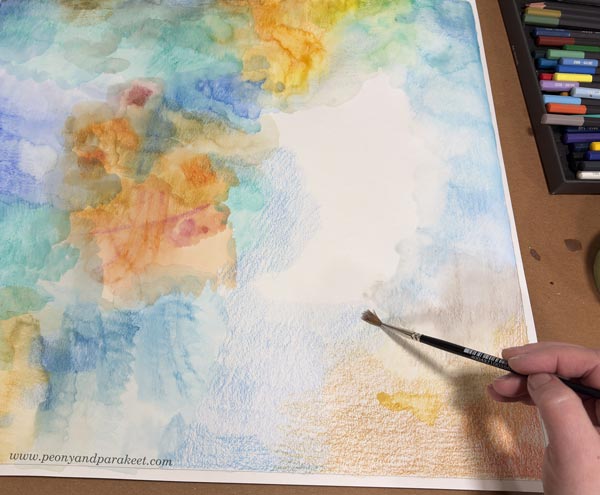 Creating freely with watercolor pencils. Spreading the color with a brush.